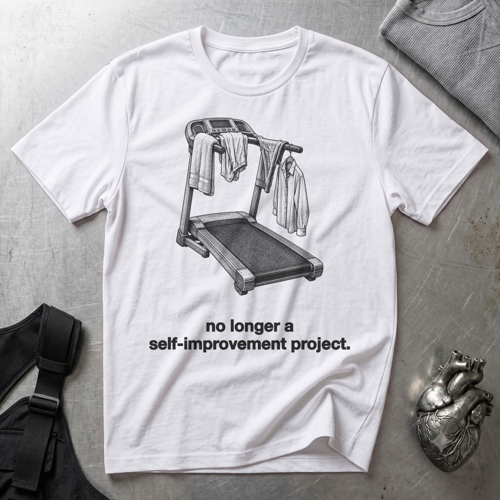 No Longer a Self-Improvement Project. White tee