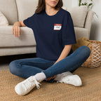 T-Shirt — 'Hello My Name Is FINE' Minimal Pocket Sticker Graphic