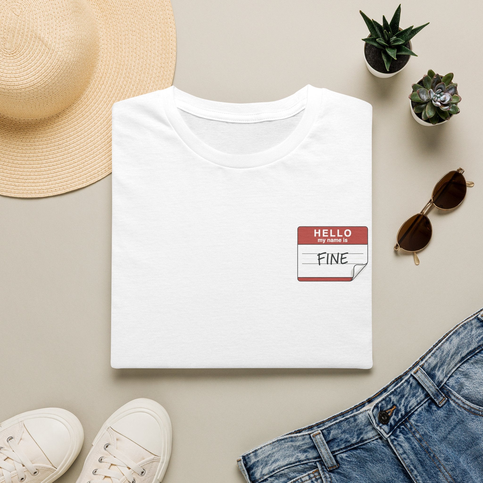T-Shirt — 'Hello My Name Is FINE' Minimal Pocket Sticker Graphic