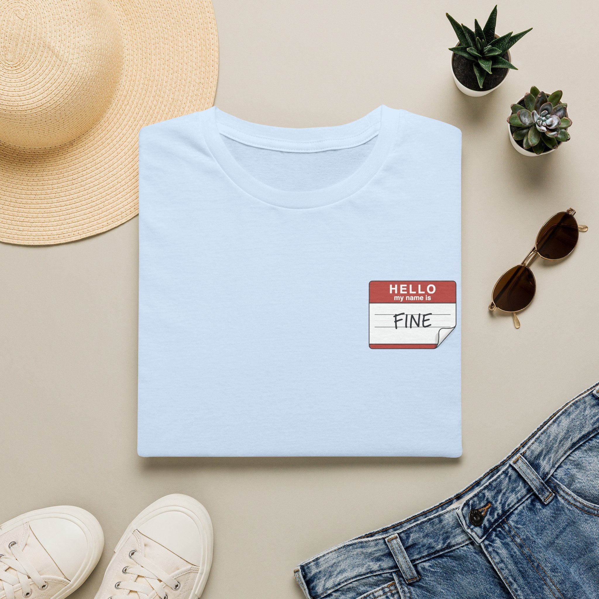 T-Shirt — 'Hello My Name Is FINE' Minimal Pocket Sticker Graphic