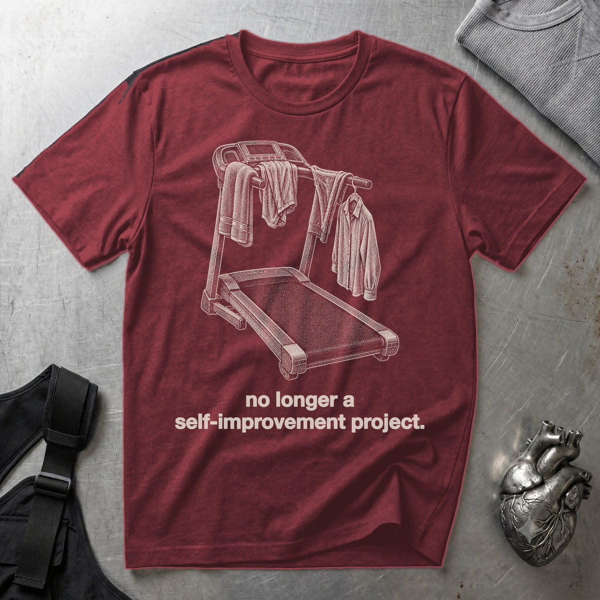 No Longer a Self-Improvement Project. Maroon tee